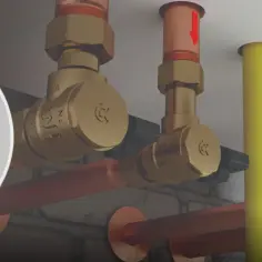 Szczegółowy widok pokazuje, jak zamontować zawór antyskażeniowy. Mosiężne elementy instalacji hydraulicznej z miedzianymi rurami.